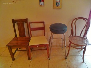 lot 105 image: a variety of vintage seating options such as bentwood bistro chairs and a metal step stool