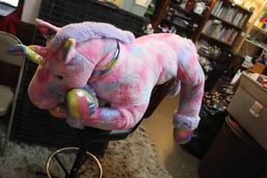 lot 131 image: large, tie-dye plush unicorn  over 3foot
