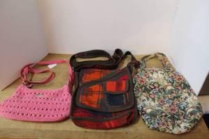 lot 143 image: distinctly styled handbags