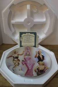 lot 151 image: vintage Marilyn Monroe collector plate is manufactured by The Bradford Exchange and includes a certificate of authenticity they are large plates that are 12inchs
