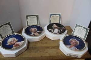 lot 153 image: vintage Bradford Exchange collector plates featuring Marilyn Monroe in their original styrofoam packaging with authenticity papers