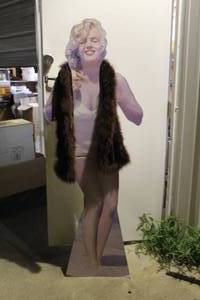 lot 159 image: Marilyn Monroe cardboard cutout with fur scarf