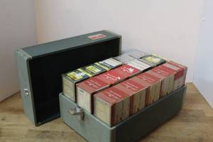 lot 172 image: vintage storage case filled with vintage items are Airequipt automatic slide changer magazines, typically used for storing and projecting 35mm slides