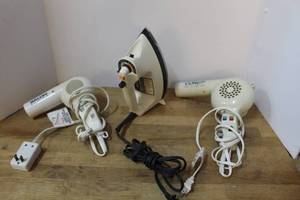 lot 193 image: Two hair dryers and an iron