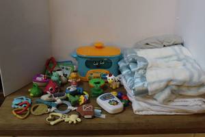 lot 203 image: Previously loved toys and blanket