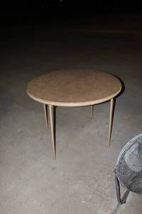 lot 260 image: Round table with folding legs