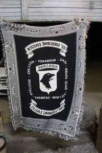 lot 269 image: decorative throw blanket featuring the 101st Airborne Division Screaming Eagles