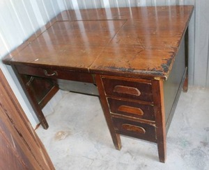 lot 285 image: vintage oak typewriter desk features a flip-top mechanism and three drawers on the right side.