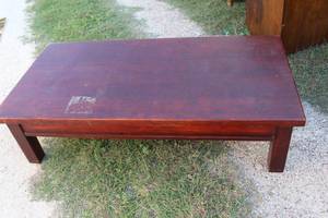 lot 286 image: low-profile rectangular coffee table features a dark wood finish and simple, straight legs