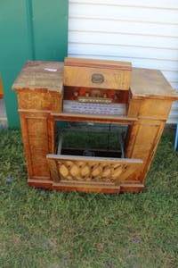 lot 291 image: vintage Philco radio phonograph console cabinet features a distinctive lift-top design and a fall-front for the turntable