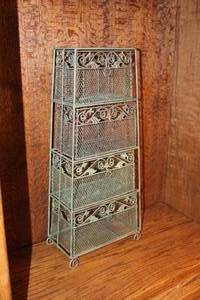 lot 37 image: metal wire bakers rack features a four-tier shelving unit with scrolling decorative accents