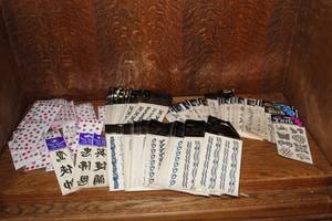 lot 138 image: sheets of temporary tattoos and more
