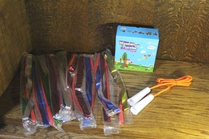 lot 157 image: 6- Wooden Puzzles in a box unopened and ribbon wands sometimes called dance ribbons and a jump rope