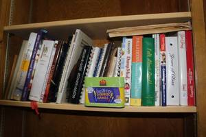 lot 159 image: Cook books and a game