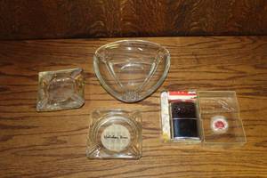lot 165 image: Ashtrays and vintage windproof lighter