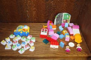 lot 218 image: LeapFrog Fridge Phonics Magnetic Letter Set and Lego doll set