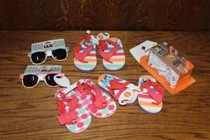 lot 234 image: Kids sandals and glasses and more see picture