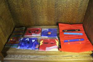 lot 292 image: Superhero mask and capes and slap bracelets and more see pictures
