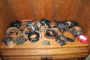 lot 298 image: collection of assorted mens and womens belts and a a 2014 Freedom Is Not Free patriotic brass belt buckle