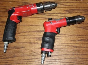 lot 313 image: two industrial pistol-grip pneumatic air drills
