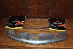 lot 349 image: vintage, weathered automotive trim piece bearing the Pontiac nameplate lettering across the front   and more see pictures