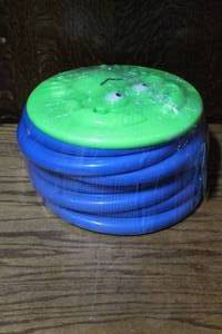 lot 362 image: Stack of frisbees and one sand toy