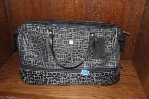 lot 386 image: Travel bag