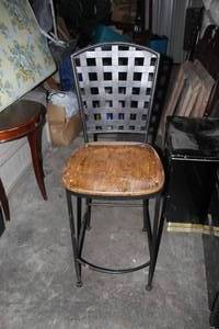 lot 460 image: metal bar stool features a distinct grid-pattern backrest and a warm, finished wooden seat