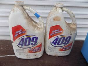 lot 49 image: 2 partial bottles 409