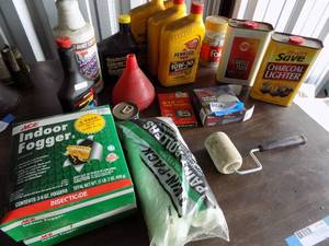 lot 68 image: Motor oil,, lighter fluid plus