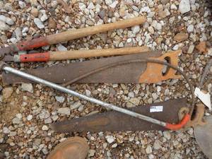 lot 89 image: Hand saws, loppers, and drain cleaners