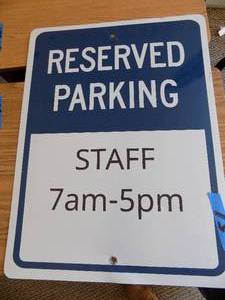 lot 51 image: STAFF PARKING sign