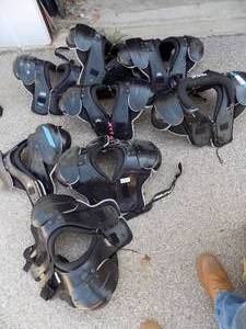 lot 21 image: Football shoulder pads x 8