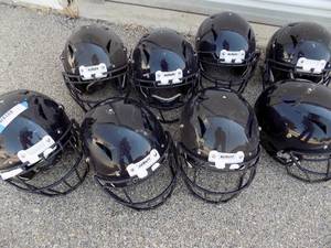 lot 214 image: Shutt Football helmets x 8   S,M,L