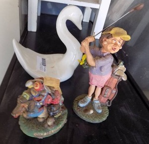 lot 224 image: Swan, lady golfer and golf