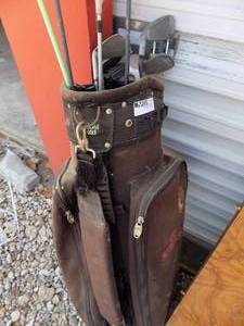 lot 228 image: Golf clubs irons and woods