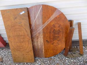 lot 227 image: DINING TABLE - BURR WALNUT (LOVELY)  ROUND  OR OBLONG AS IT HAS ONE LEAF,  LEGS ARE OFF FOR TRANSPORT