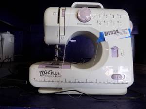 lot 244 image: Singer Pixie plus sewing machine