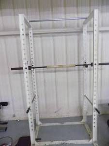lot 270 image: Power rack and pull up bar and barbell