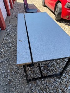 lot 13 image: TABLES  5 FT LENGTH, APPROX 30 WIDE WITH A 6  FLIP UP AND A METAL CHANNEL  QTY 3
