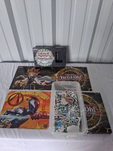 lot 20 image: Loot Crate Borderlands Mousepad, Yu-Gi-Oh Game Boards and Small Tote of Pop Culture Stickers