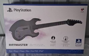 lot 26 image: Playstation 45 Riffmaster Guitar---NIP