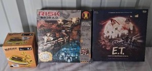 lot 30 image: Selection of Board Games---E.T., Yahtzee The Office, & RISK 2210---E.T. & Yahtzee are new