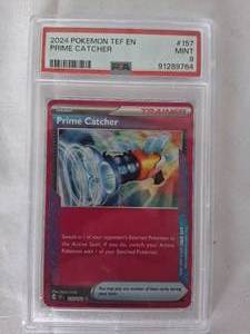lot 42 image: PSA Grade 9 Prime Catcher 2024 Pokemon Card