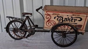 lot 69 image: Antique Baker Wrought Iron Delivery Tricycle----Needs some TLC