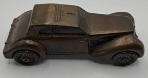 lot 101 image: 1974 Banthrico Cast Metal Coin Bank