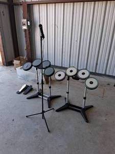 lot 104 image: Xbox & Playstation Rockband Drum Kits and Accessories