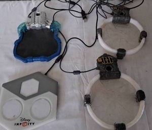 lot 152 image: Disney Infinity Portal and 3 Skylander Portals---Unknown working condition
