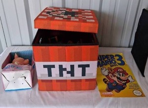 lot 154 image: Minecraft TnT Block Filled with New and Used Toys---See pics