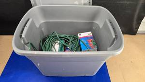 lot 44 image: Large Tote w Misc Exterior Christmas Extension Cord, Lights, Spotlight & Bulbs